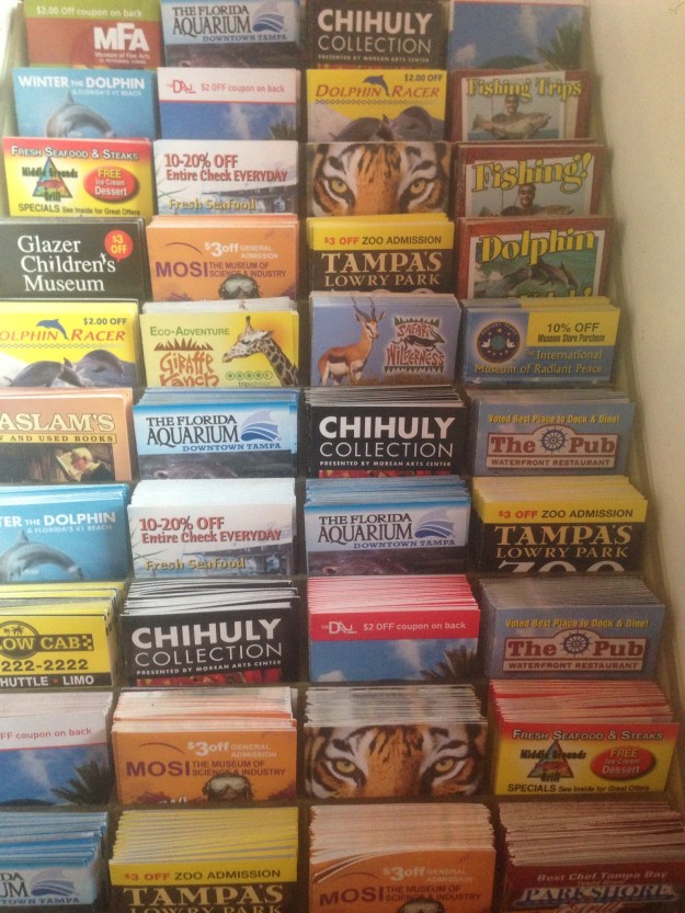 This is a mini-brochure rack.  These brochures are small and fit in your wallet and provide just enough information and often a coupon for admission or a discount on a meal.